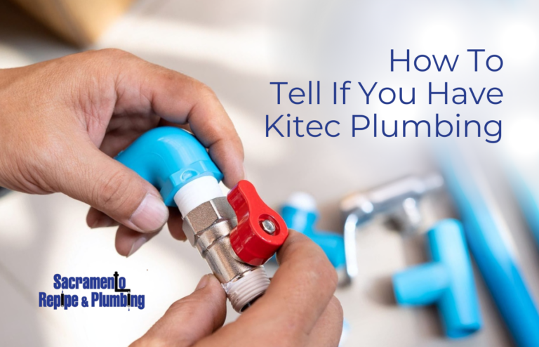 Two hands holding a piece of pipe with a valve